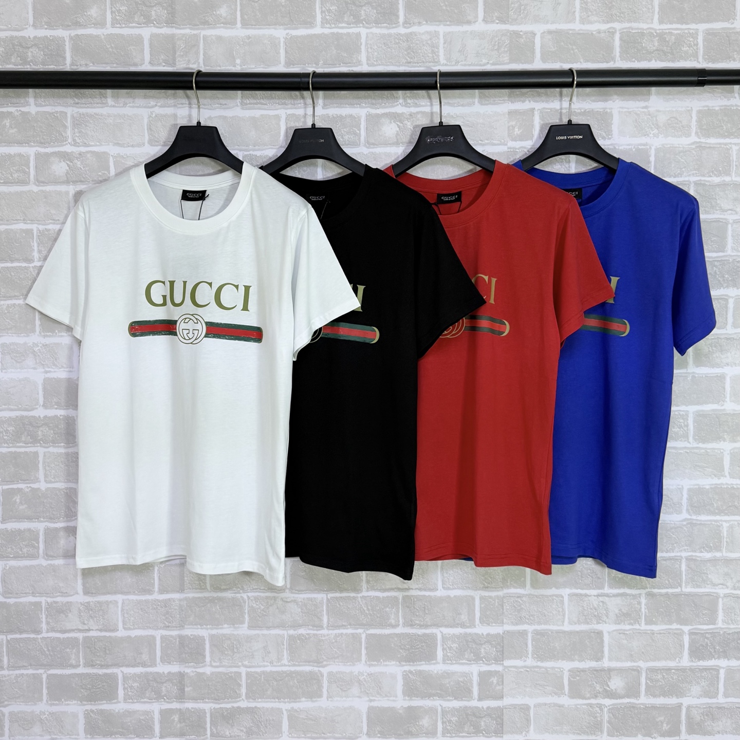 gg camisetas de cuatro colores nuevos