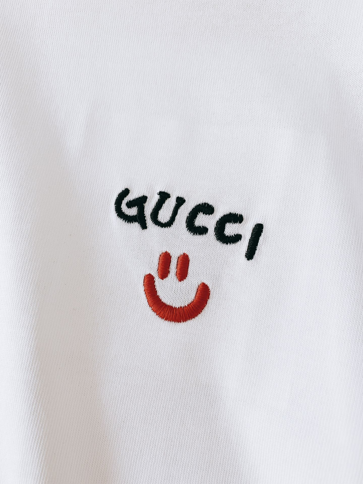 Gucci 2025SS White T-Shirt with Embroidered Logo and Smiley Face 5 i1750684562 5868 7