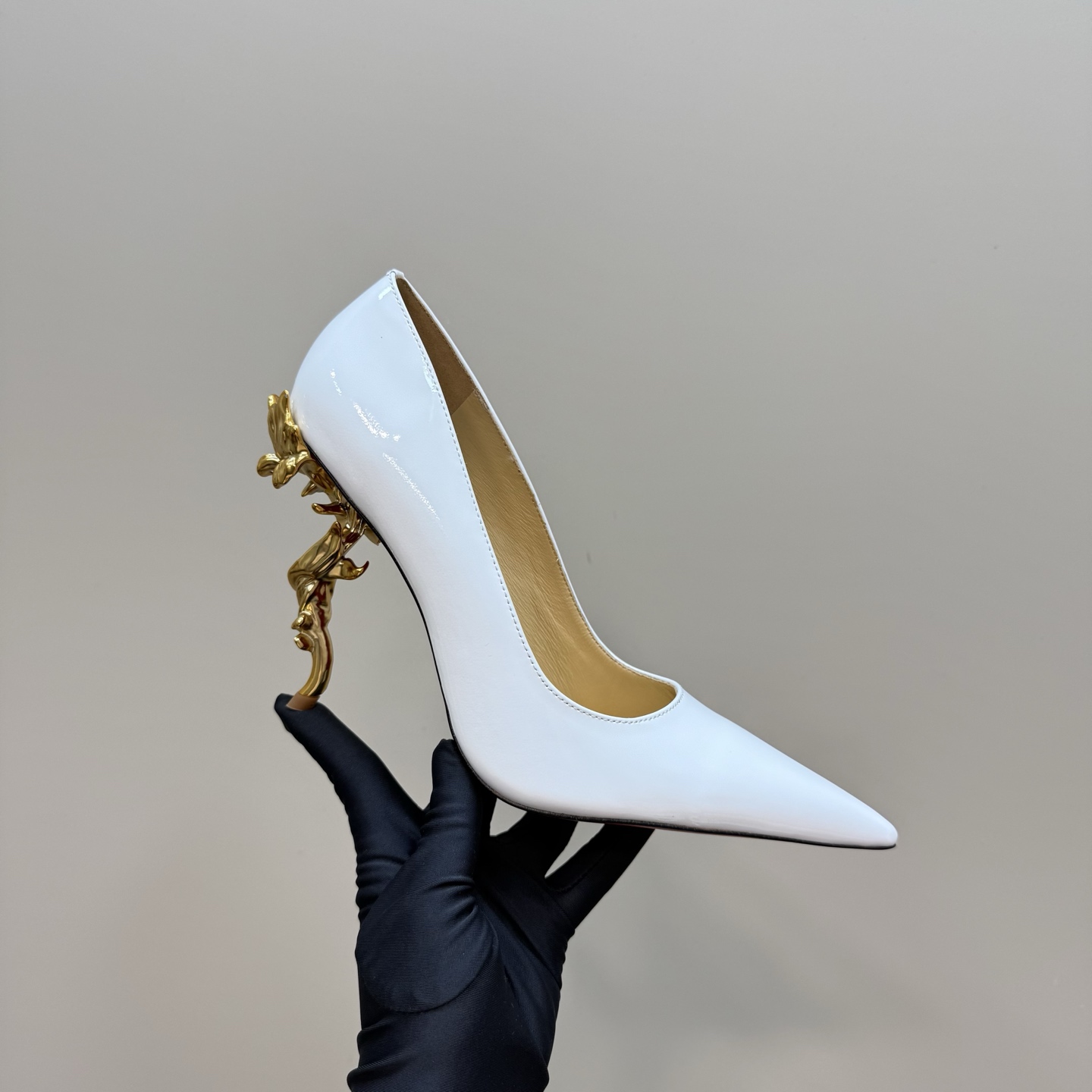 Christian Louboutin White Patent Leather Pumps with Sculptural Gold Heel 2 i1743375953719 3229 0 6