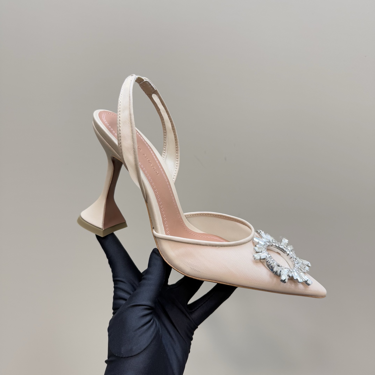 Amina Muaddi Women's Champagne Slingback Heels with Crystal Embellishment 1 Amina Muaddi Women's Champagne Slingback Heels with Crystal Embellishment