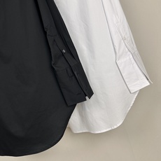 MM6 Maison Margiela,中长款长袖印花衬衫标志性解构美学与街头艺术风格的融合之作。它采用 MM6 Maison Margiela,中长款长袖印花衬衫标志性解构美学与街头艺术风格的融合之作。它采用