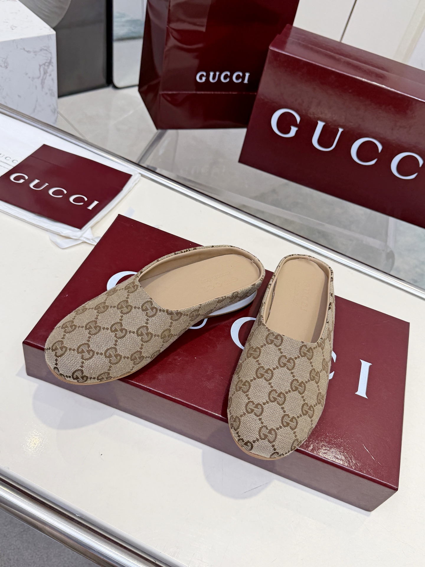 Gucci Beige GG Slip-On Mules