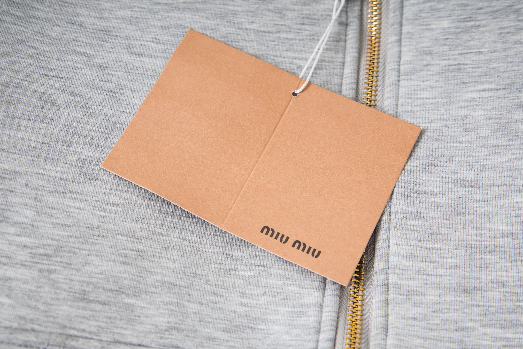 Miu Miu/缪缪 25ss 徽标贴布绣太空棉连帽外套