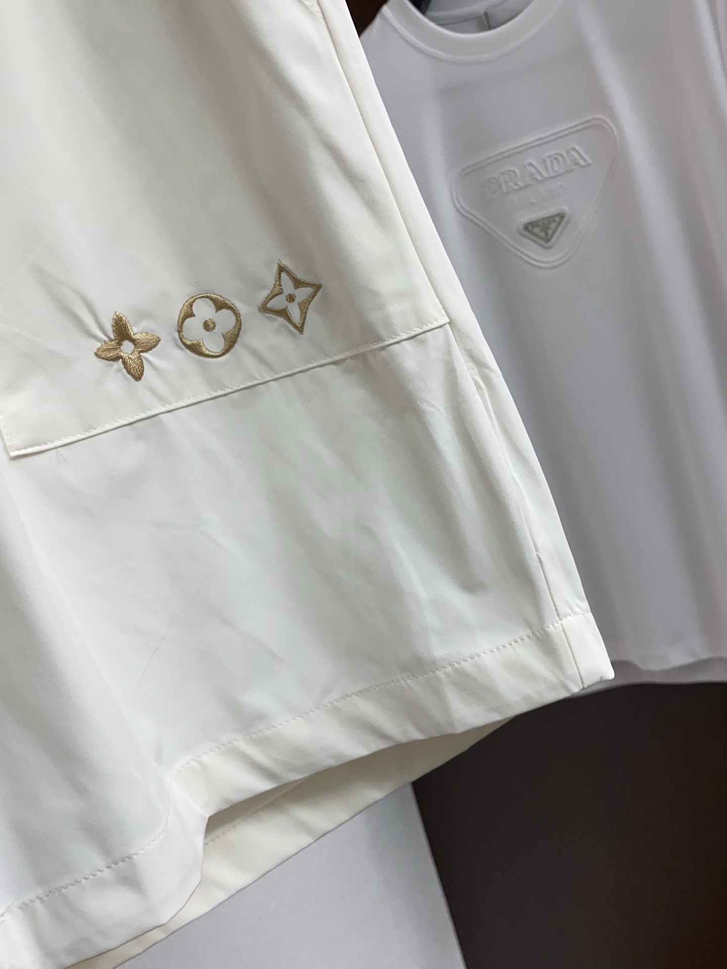 1v 路易威登 春夏新款休闲短裤 品牌经典系列 速干面料 舒适度极好，手触感强烈。原版品牌logo 辨识