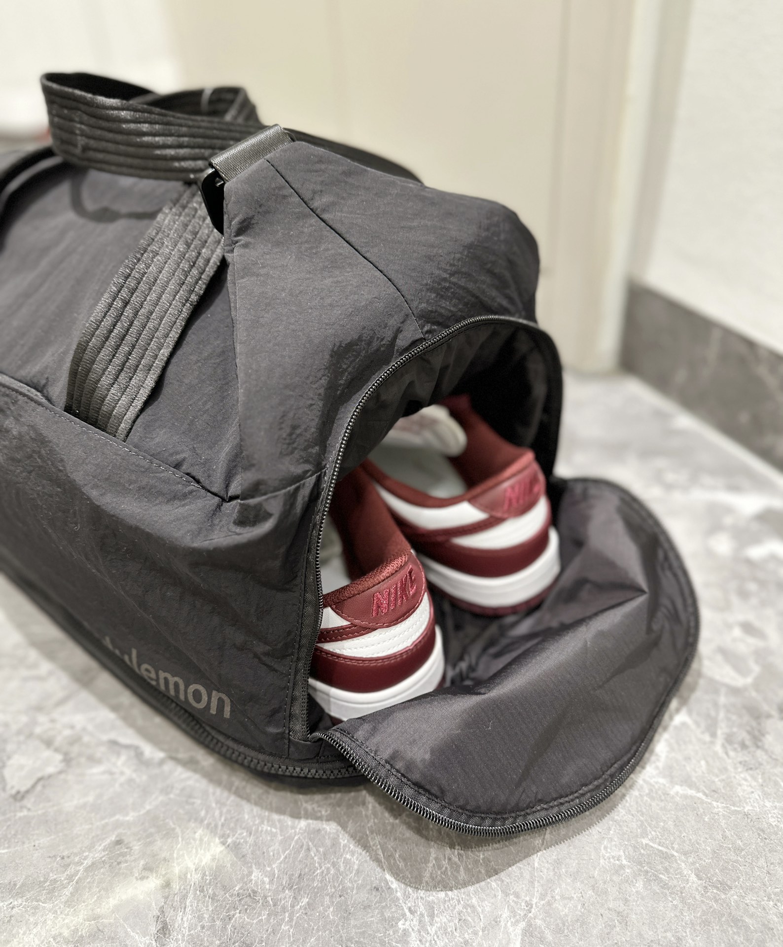 The spacious interior accommodates footwear, apparel, a laptop, an - Comprehensive 6