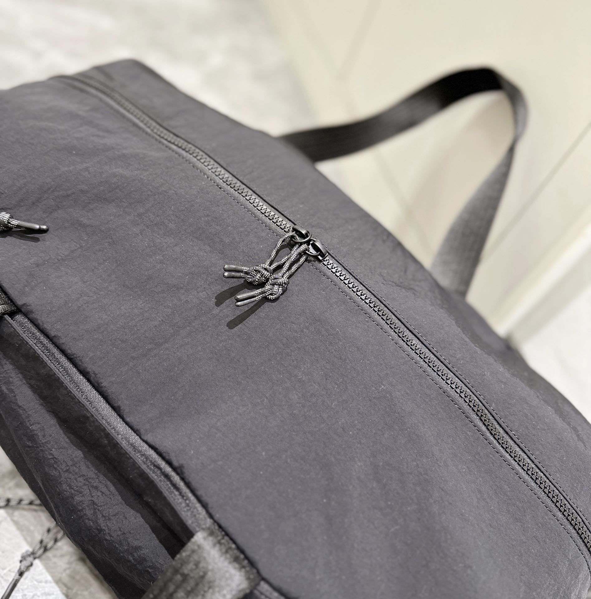 The spacious interior accommodates footwear, apparel, a laptop, an - Comprehensive 3