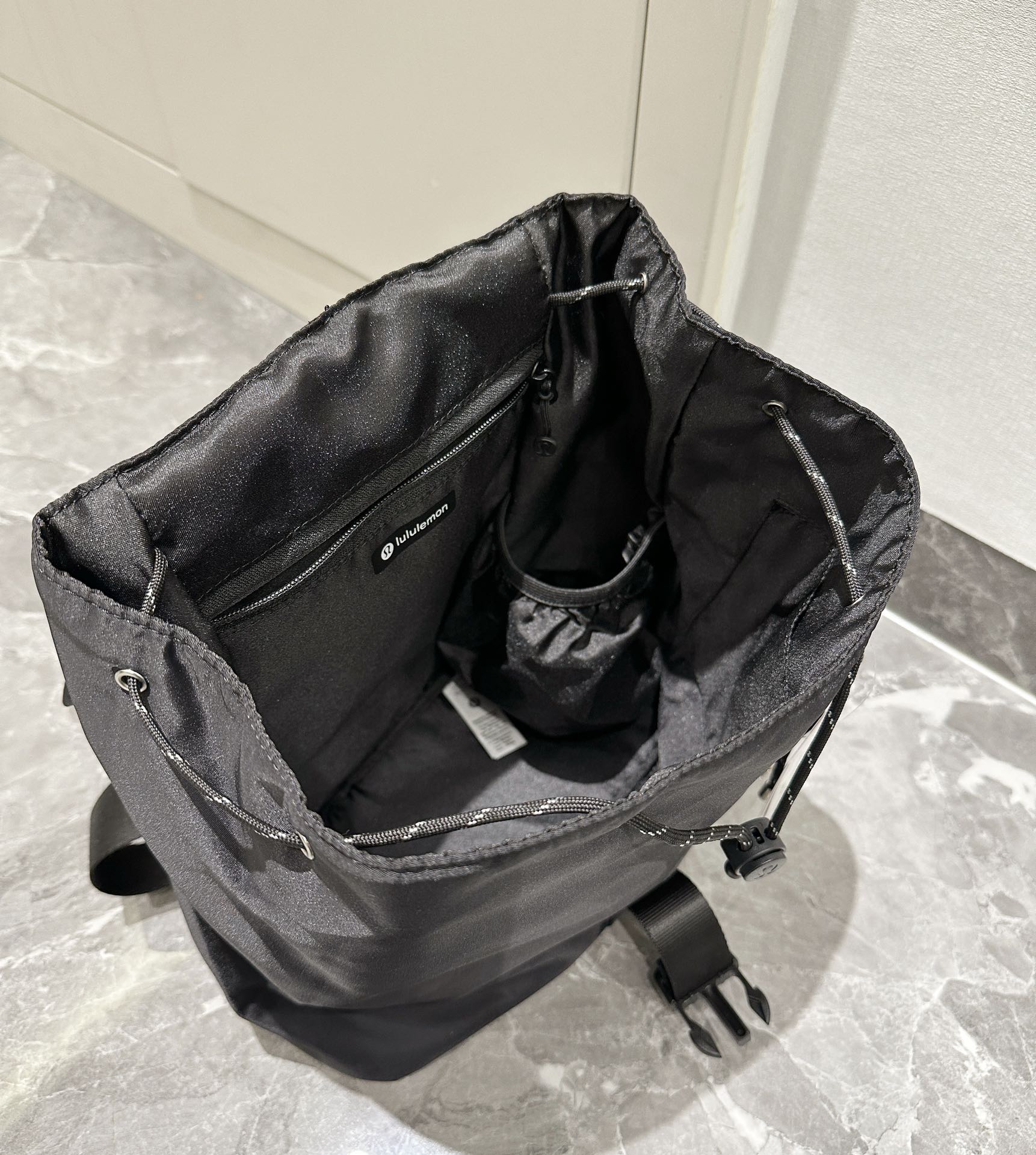 Drawstring Backpack featuring a 10L capacity, cinch-top closure - Comprehensive 9