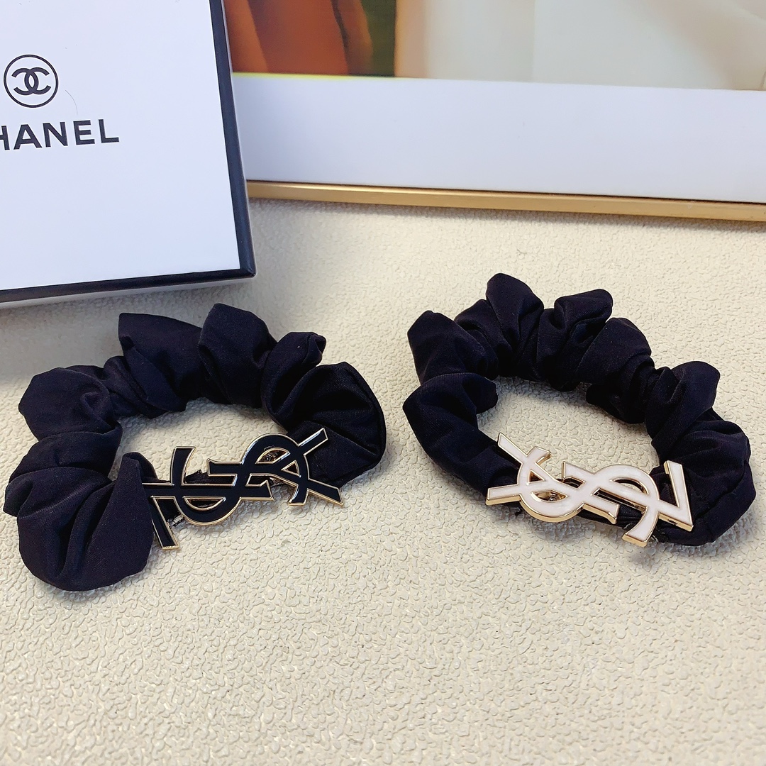 YSL St. Roland: New Logo Cortex with Chic Fairies in Singles.