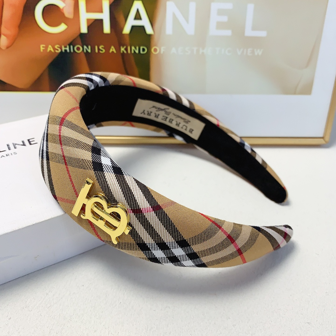 Fashion Update: Burberry Introduces Stylish White Logo on Band 95 Barbara’s Hair