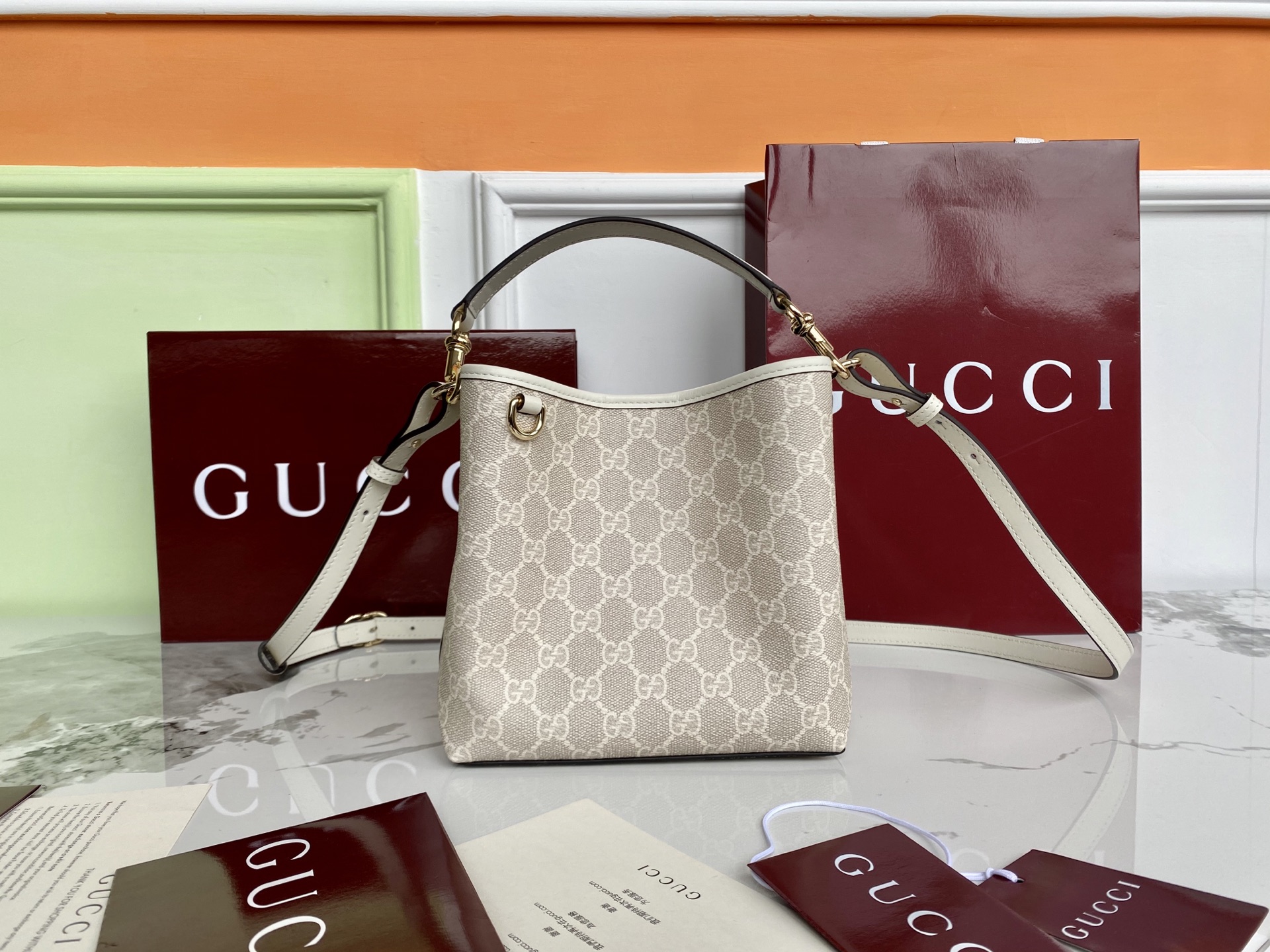Gucci Emblem Mini Bucket Bag Beige and White New Gucci Letter Pattern 2 i1748328530099 3065 0 0
