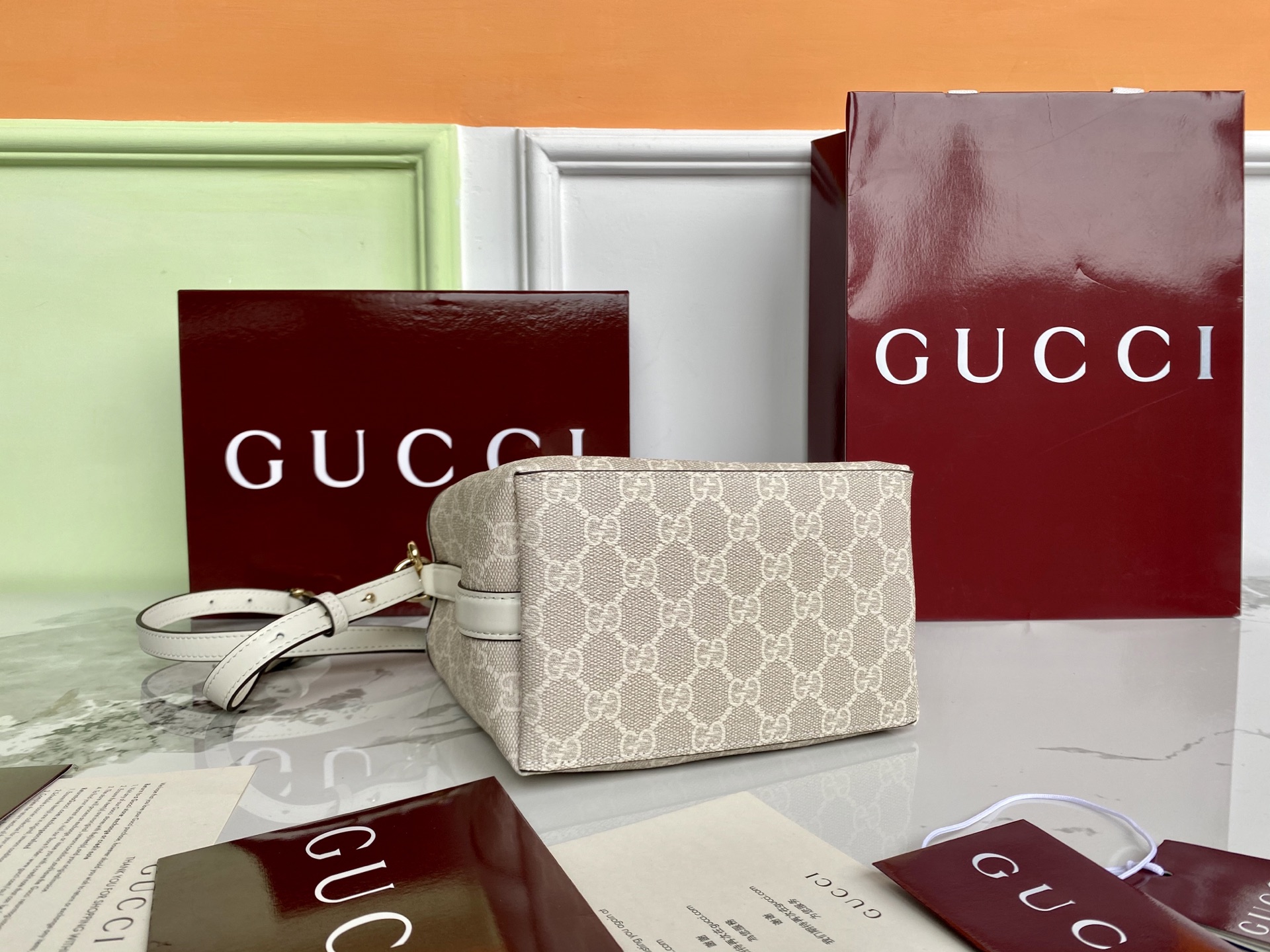 Gucci Emblem Mini Bucket Bag Beige and White New Gucci Letter Pattern 5 i1748328532438 4184 0 3