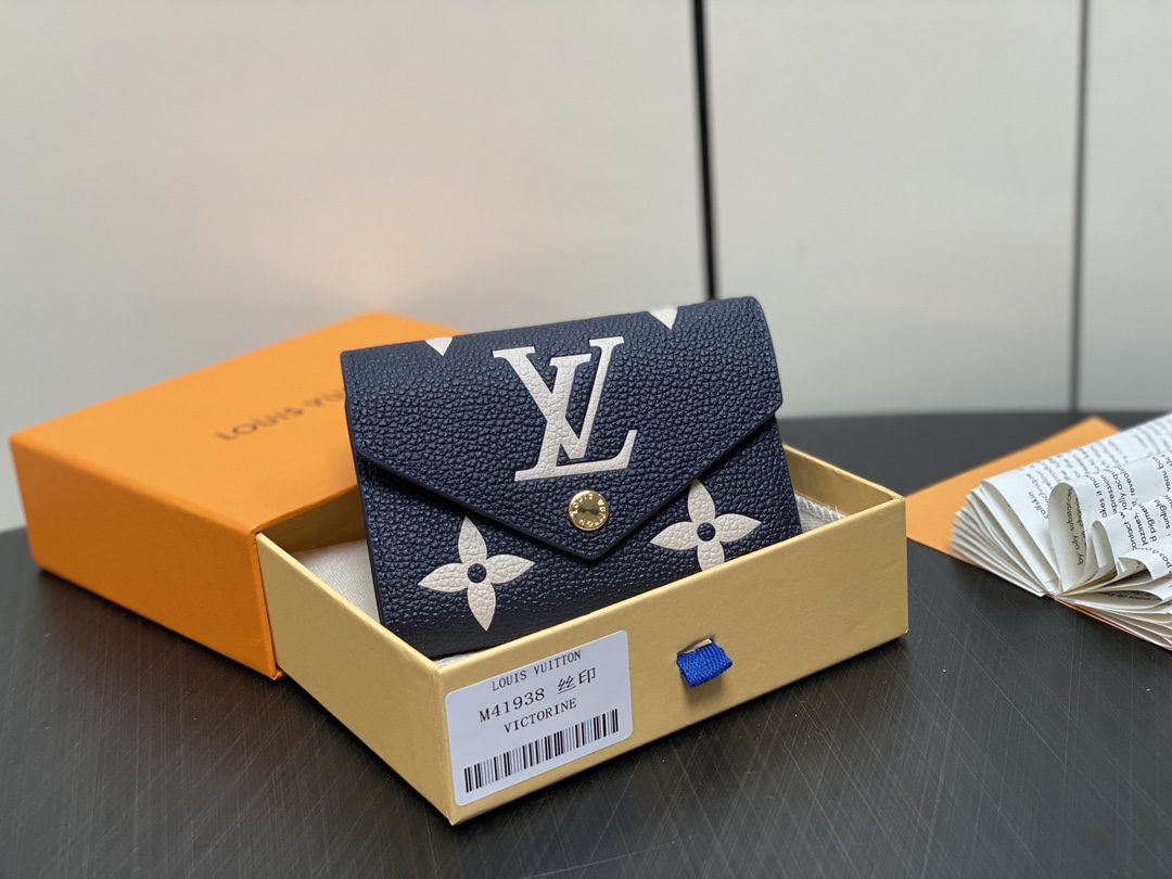 La calidad del producto más alta
 Louis Vuitton Barato
 Monederos Azul marino Empreinte​ Cuero de vaca M41938