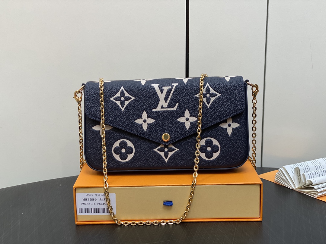 Louis Vuitton Bolsos cruzados y bandoleras Azul marino Empreinte​ Pochette Cadena M83589