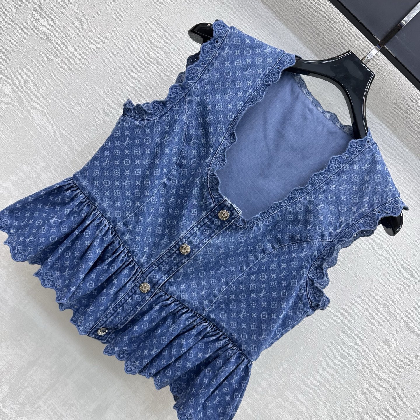 louis vuitton ruffle hem denim top