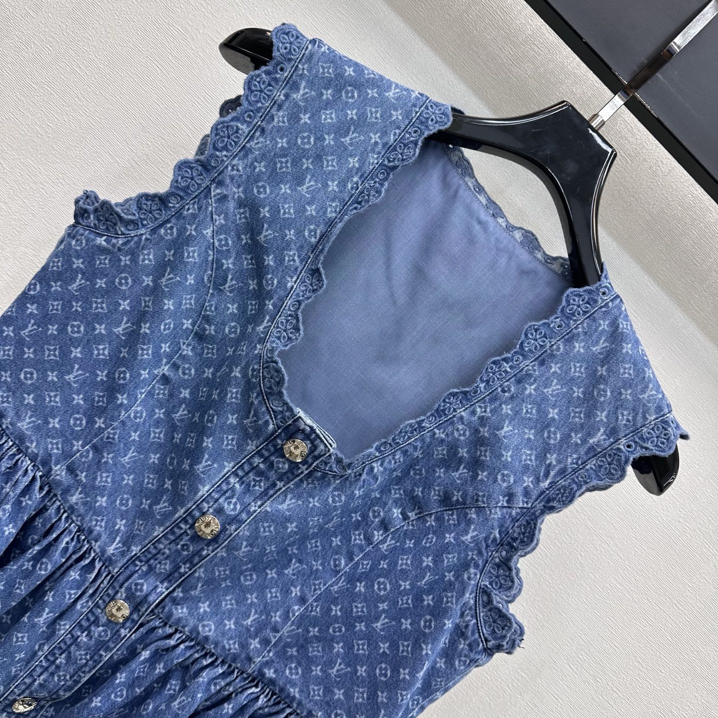 louis vuitton ruffle hem denim top