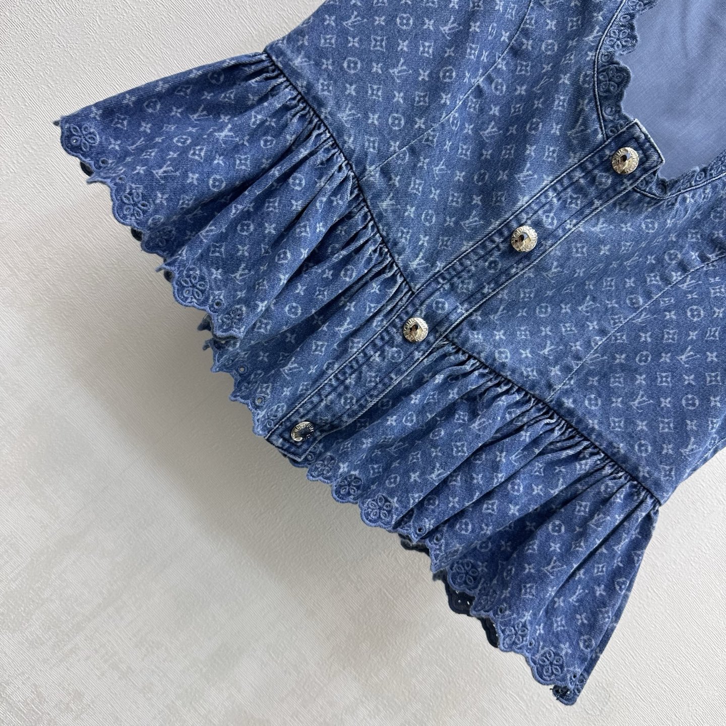 louis vuitton ruffle hem denim top