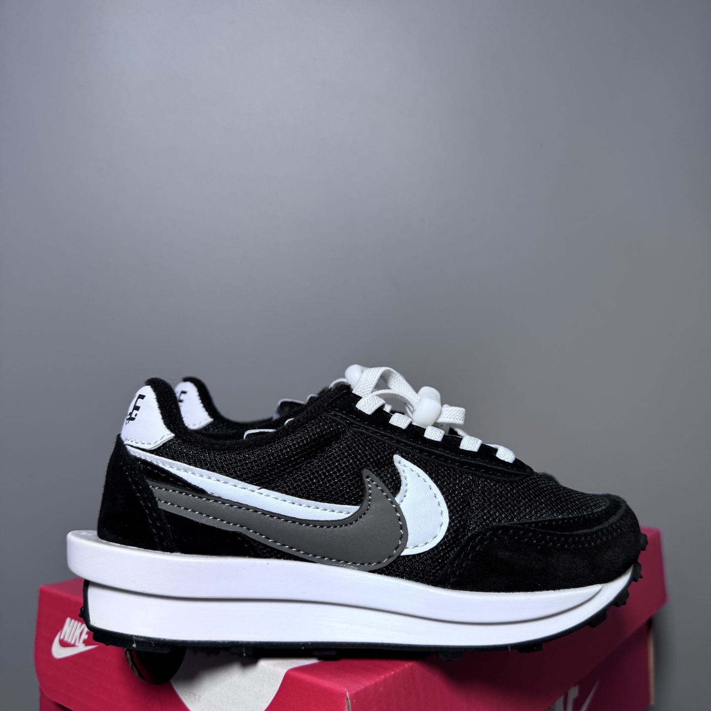 NK新款华夫松紧扣儿童休闲运动鞋 尺码：22-35码 经典华夫款式🆕 百搭又时髦✨ 松紧扣设计，穿脱方便✌🏻 橡胶耐磨防滑大底✔️ 优质面料拼接，质感满满💯-选品中心