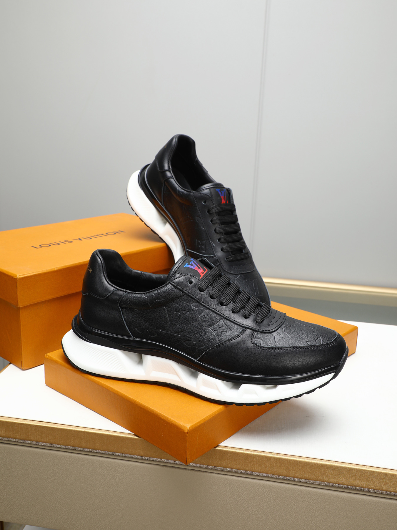Louis Vuitton Men's Black Leather Sneaker with Embossed Monogram Pattern 5 i1743235532262 4394 0 3