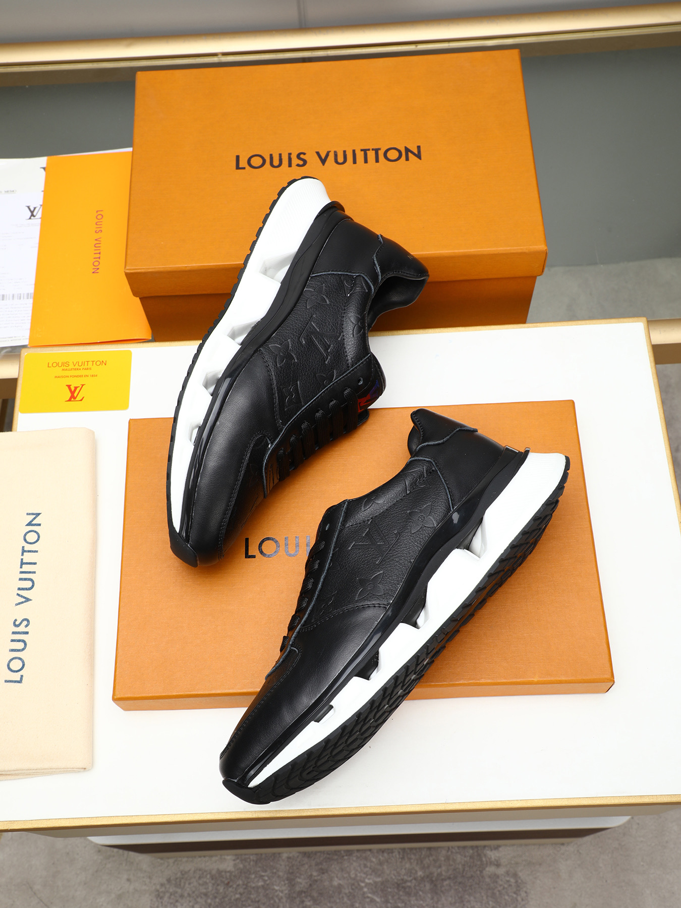 Louis Vuitton Men's Black Leather Sneaker with Embossed Monogram Pattern 8 i1743235532264 5928 0 6