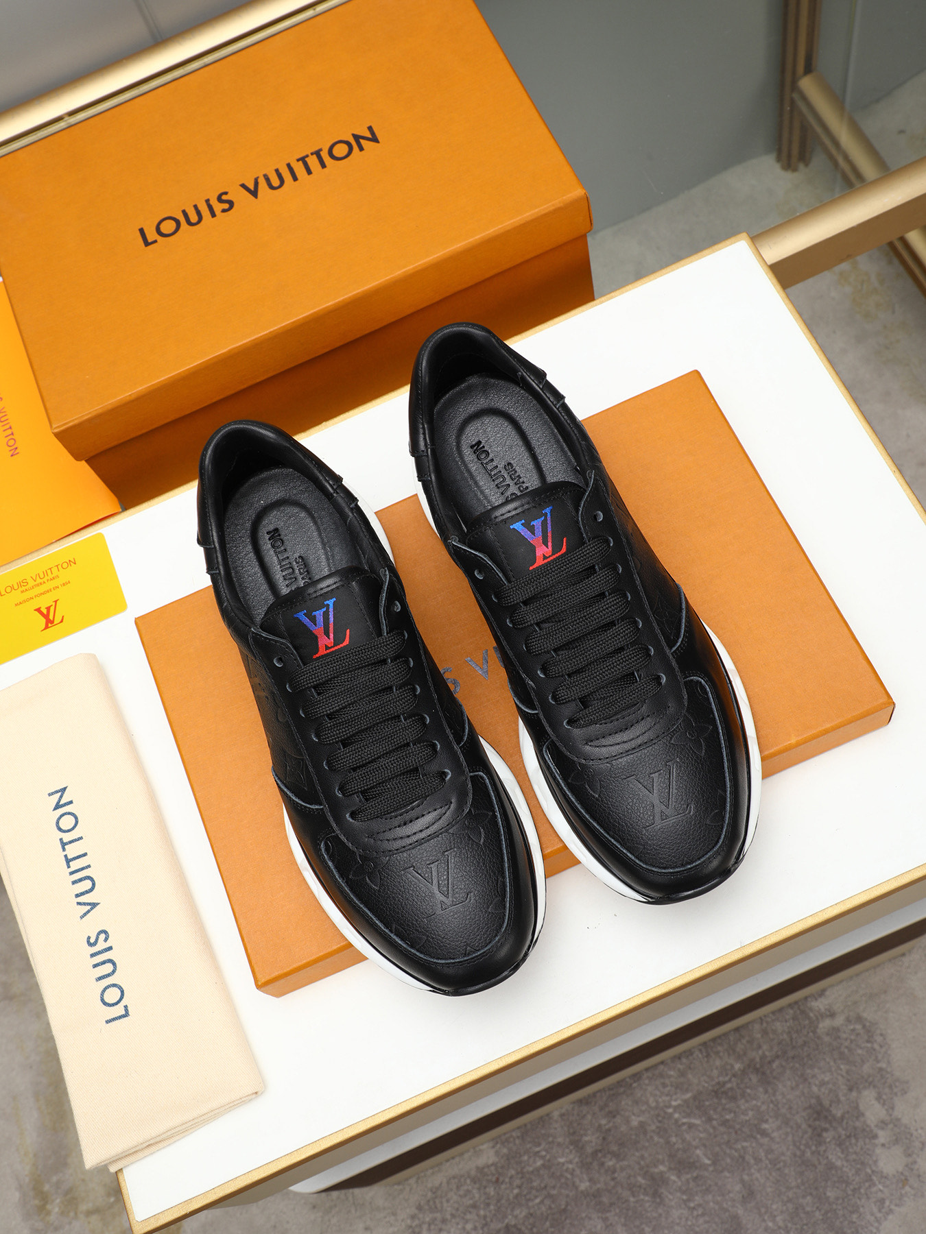 Louis Vuitton Men's Black Leather Sneaker with Embossed Monogram Pattern 9 i1743235532515 8895 0 7