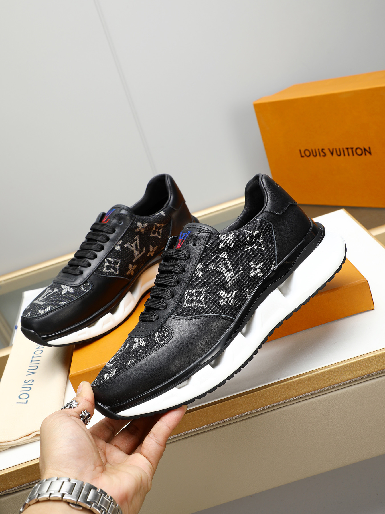 Louis Vuitton Men's Trainer Sneaker in Monogram Textile and Leather 3 i1743235584610 4807 0 1