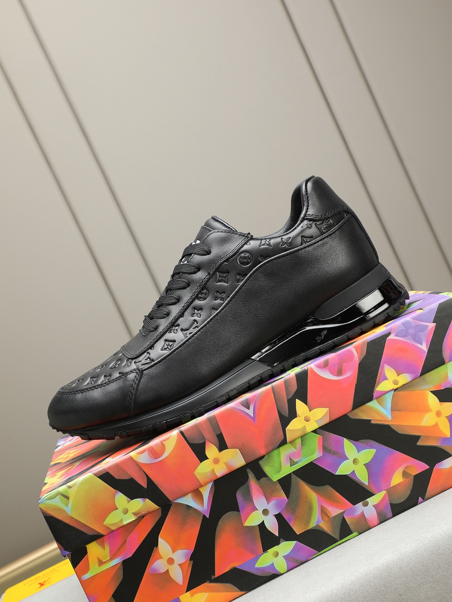 Louis Vuitton Men's Black Leather Sneakers with Monogram Embossed Design 7 i1744796376461 6105 0 5