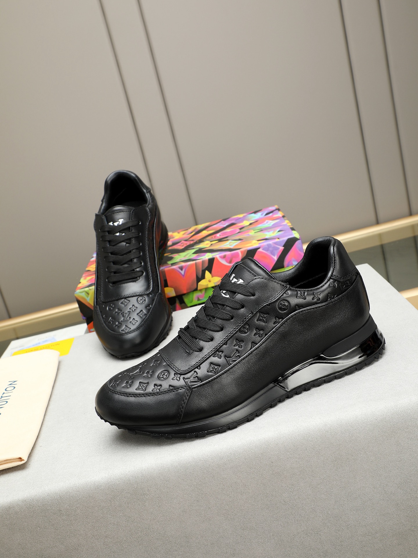 Louis Vuitton Men's Black Leather Sneakers with Monogram Embossed Design 8 i1744796376467 6518 0 6