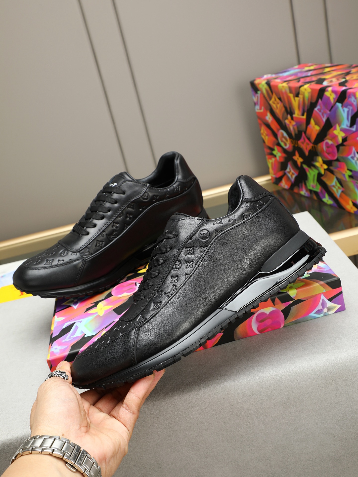 Louis Vuitton Men's Black Leather Sneakers with Monogram Embossed Design 3 i1744796378108 4657 0 1