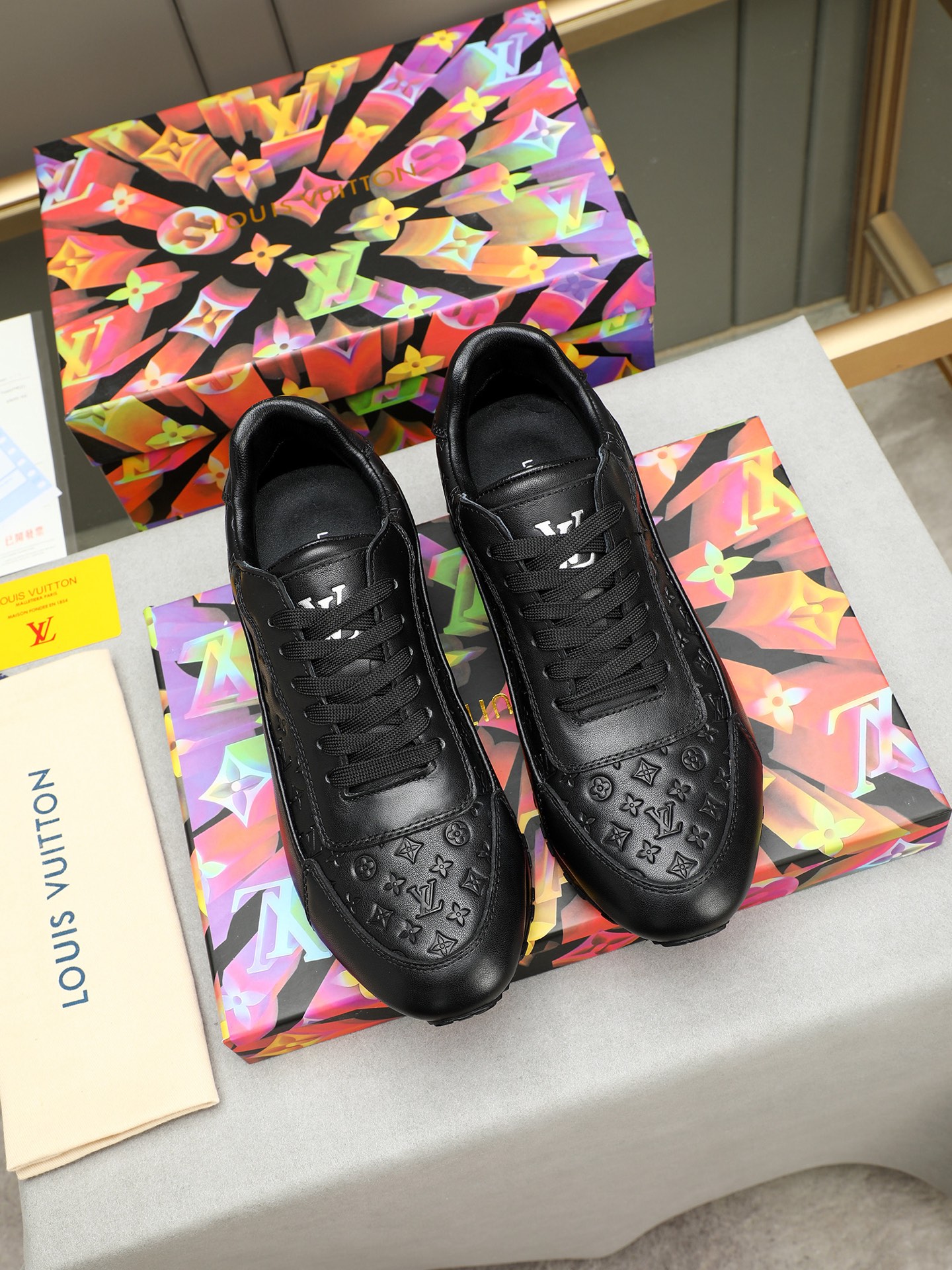 Louis Vuitton Men's Black Leather Sneakers with Monogram Embossed Design 9 i1744796378136 8747 0 7