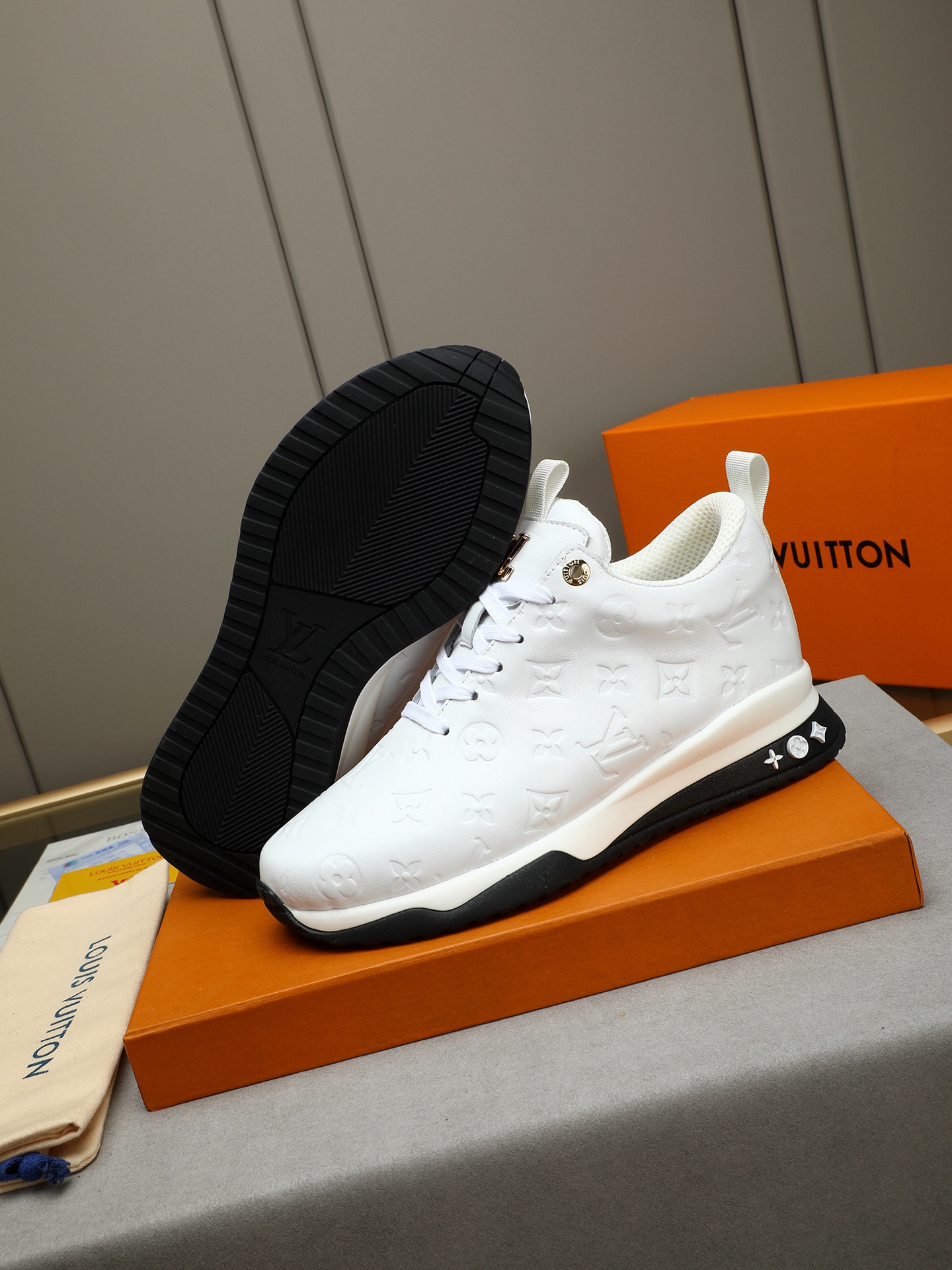 Louis Vuitton Men's White Leather Casual Sneakers with Monogram Embossing 4 i1745483938589 1987 0 2
