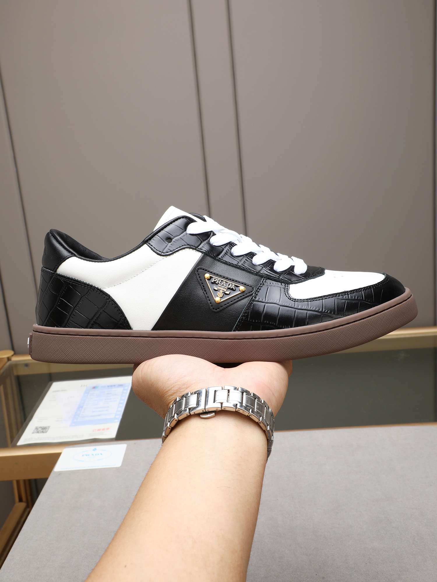 Prada Men's Black & White Leather Low-Top Sneakers - EU 38-44 Available 1 Prada Men's Black & White Leather Low-Top Sneakers - EU 38-44 Available