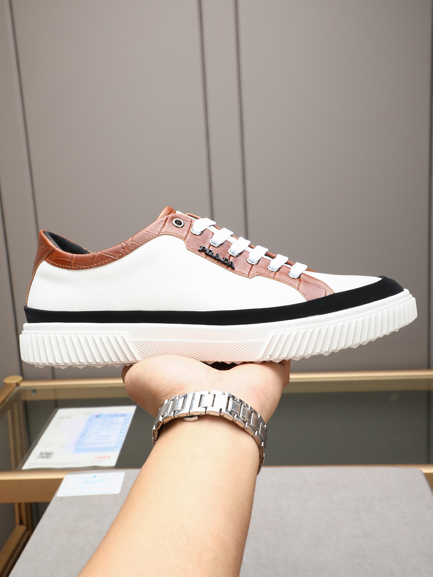 Prada Men's Leather Low-Top Sneakers Casual Fashion Sneakers. 1 Prada Men's Leather Low-Top Sneakers Casual Fashion Sneakers.