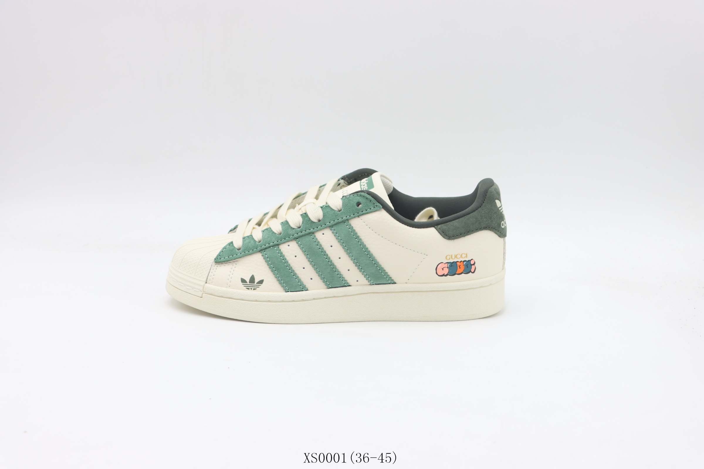 💰200
【公司级     贝壳头系列】阿迪达斯/Adidas  阿迪三叶草贝壳头板鞋       白绿古驰
货号：XS0001尺码：36 36.5 37 38 38.5 39 40 40.5 41 42 42.5 43 44 45
❗️❗️❗️
阿迪达斯AdidasSUPERSTAR贝壳头系列低帮百搭休闲运动板鞋