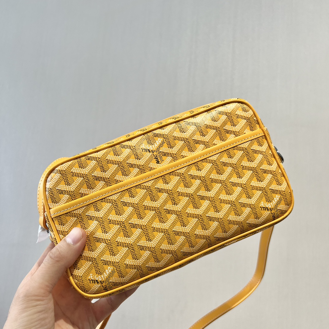 Commonly known as the Goyard Camera Bag, this piece features a - Comprehensive