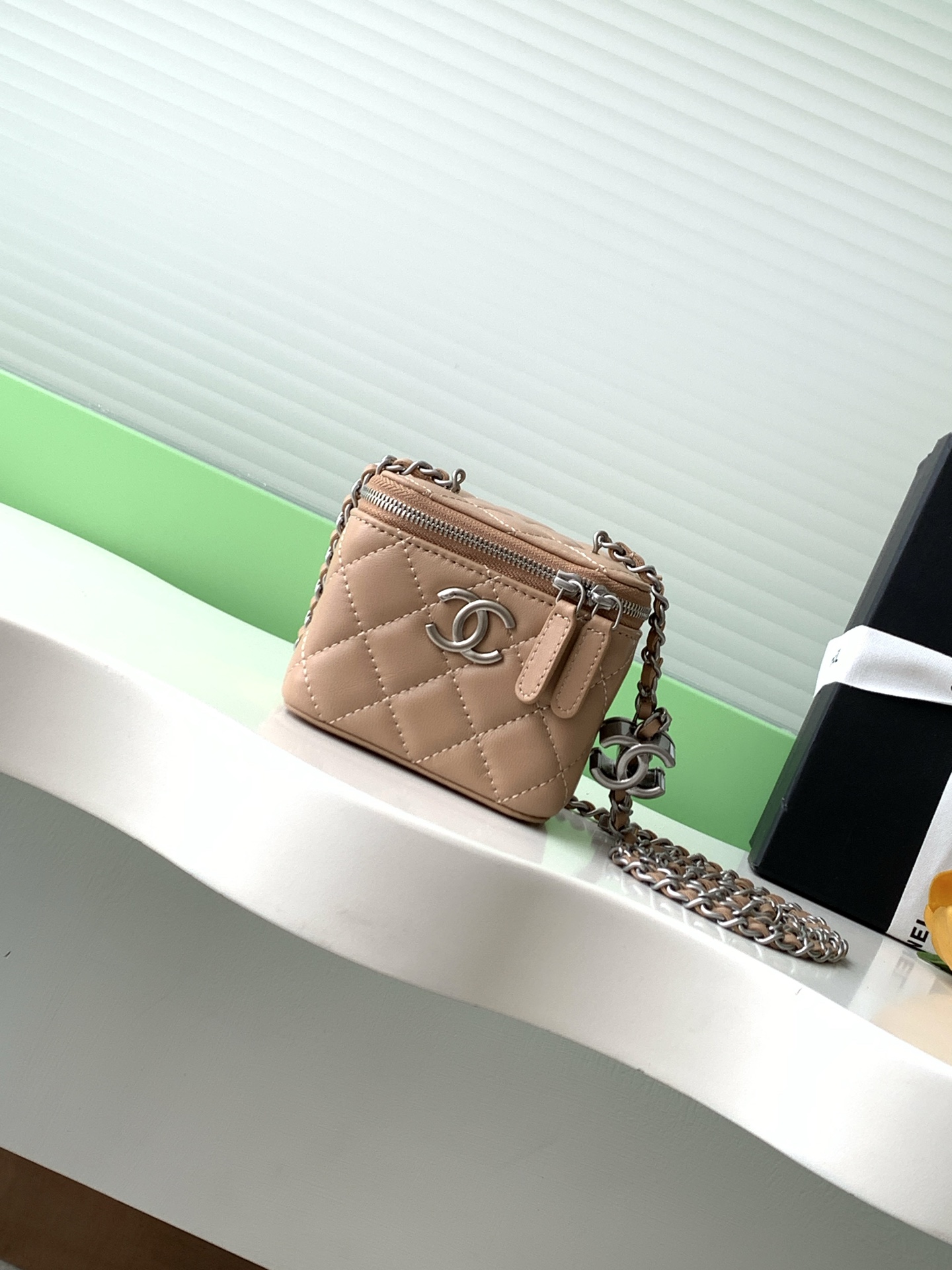 Elegant Lambskin Vanity Bag with Enamel Logo & Adjustable Chain