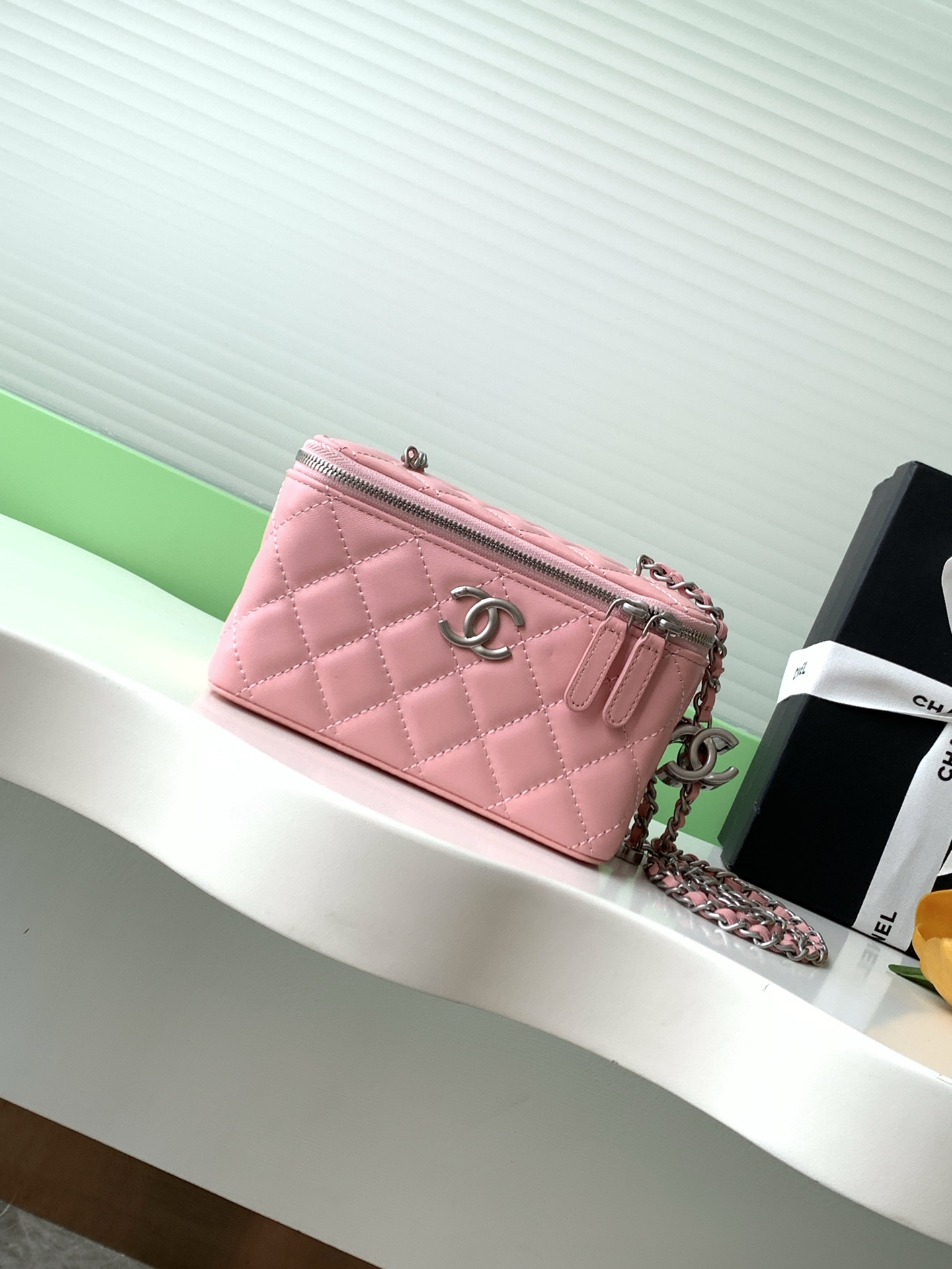 Elegant Lambskin Vanity Bag with Enamel Logo and Adjustable Buckle