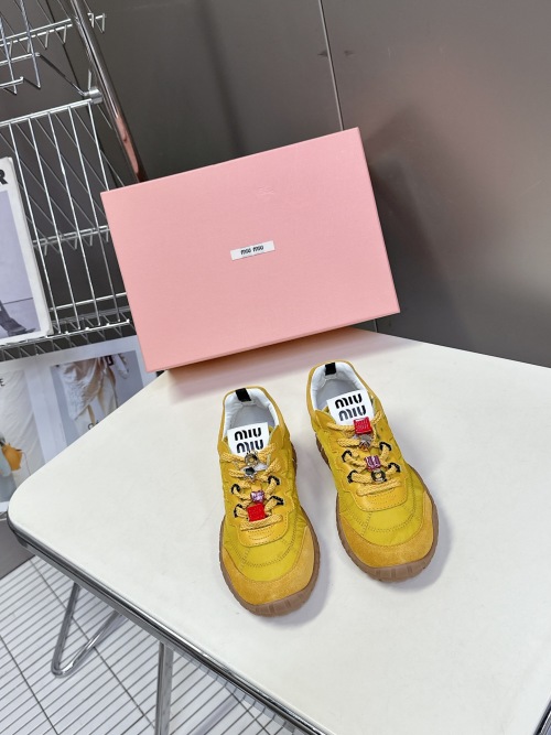 Miu Miu Women's Yellow Canvas and Suede Trim Platform Sneakers 1 Miu Miu Women's Yellow Canvas and Suede Trim Platform Sneakers