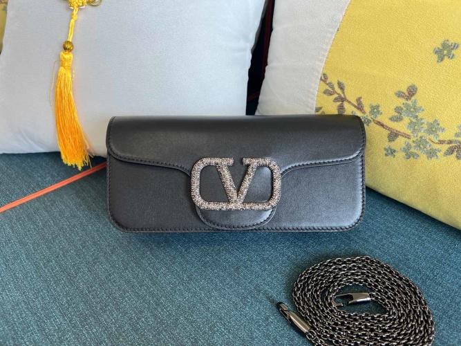 Valentino Garavani Mini Locò Crystal-Embellished Leather Shoulder Bag 1 Valentino Garavani Mini Locò Crystal-Embellished Leather Shoulder Bag