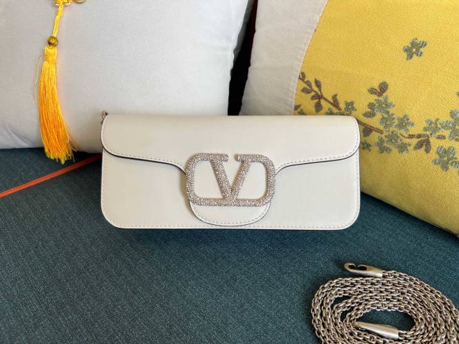 Valentino Garavani Mini Locò Handbag with Crystals - Elegant & Versatile 1 Valentino Garavani Mini Locò Handbag with Crystals - Elegant & Versatile