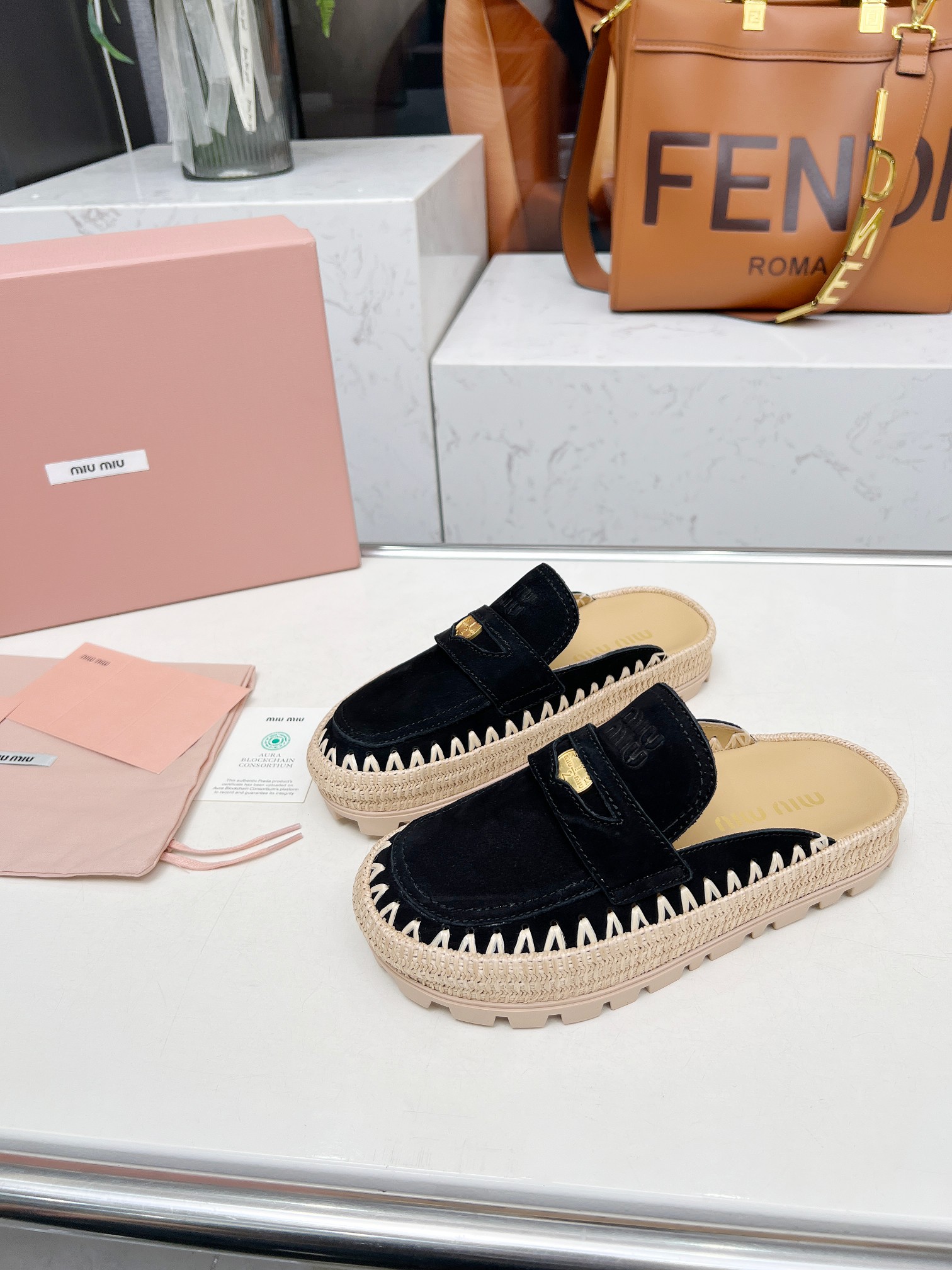 Miu Miu 2025 Spring Black Suede & Woven Mules with Logo Buckle Detail 7 a1741962172053 8462