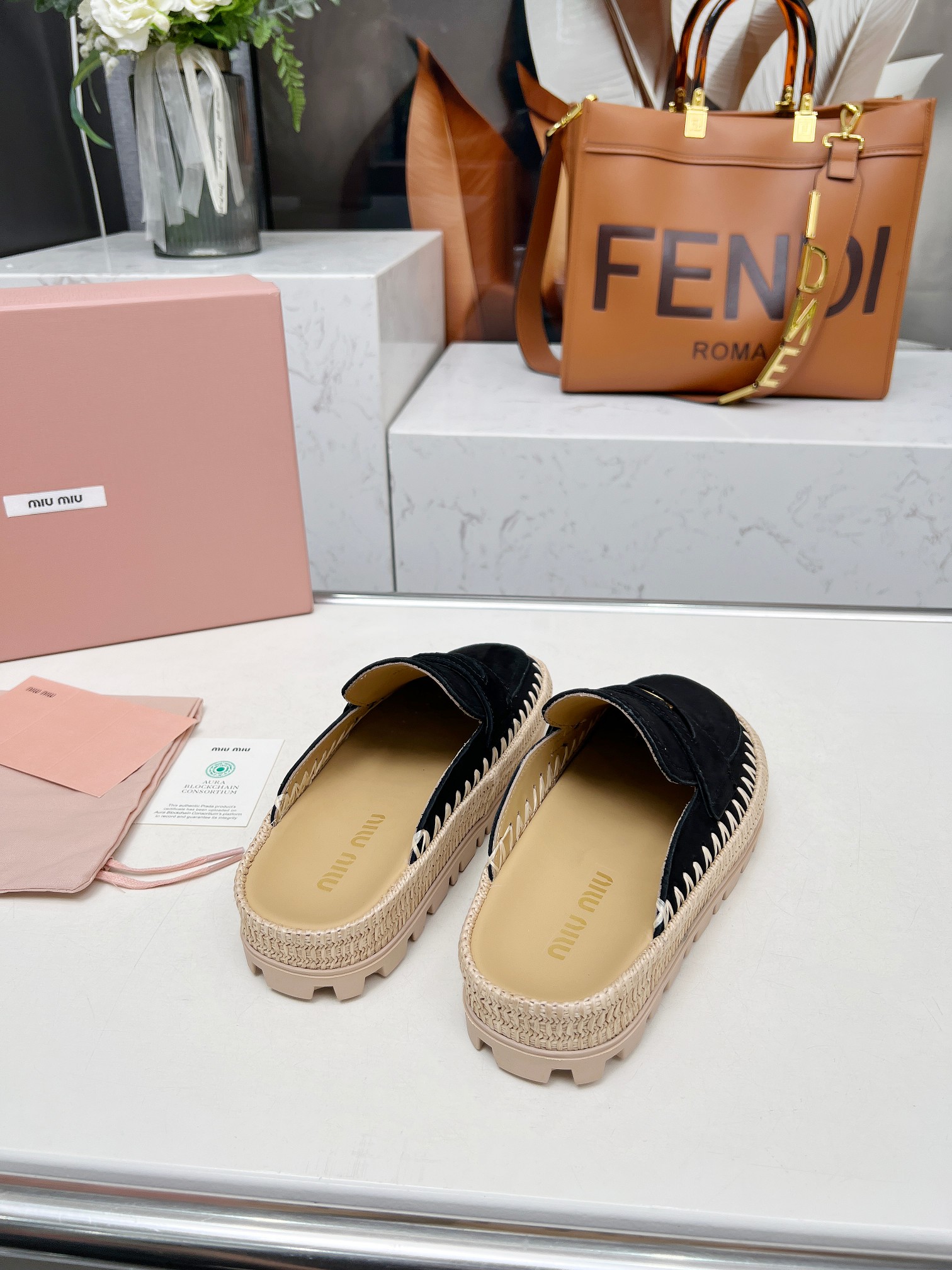 Miu Miu 2025 Spring Black Suede & Woven Mules with Logo Buckle Detail 9 a1741962172287 2444