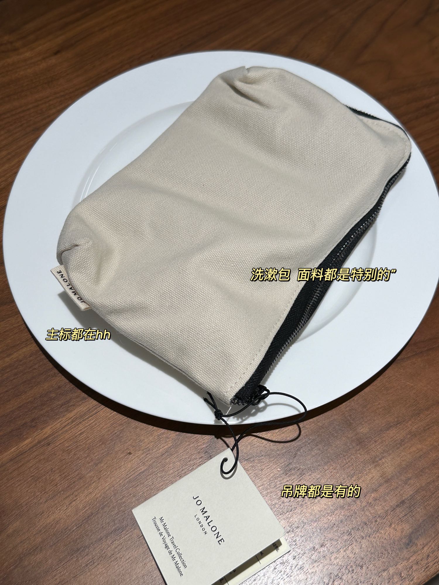 Complete with packaging and tags. Features signature branded zippers. - Comprehensive