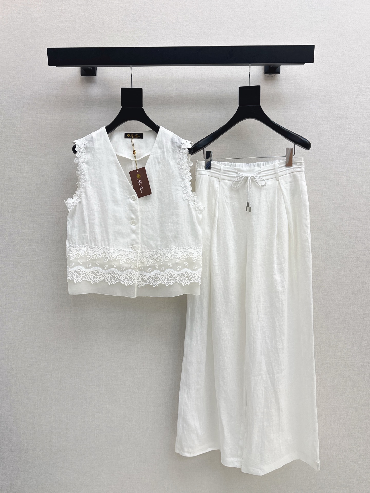 Elegant Women's V-Neck Vest and Wide-Leg Pants Set by Loro Piana 1 i1746781878740 838 0 0
