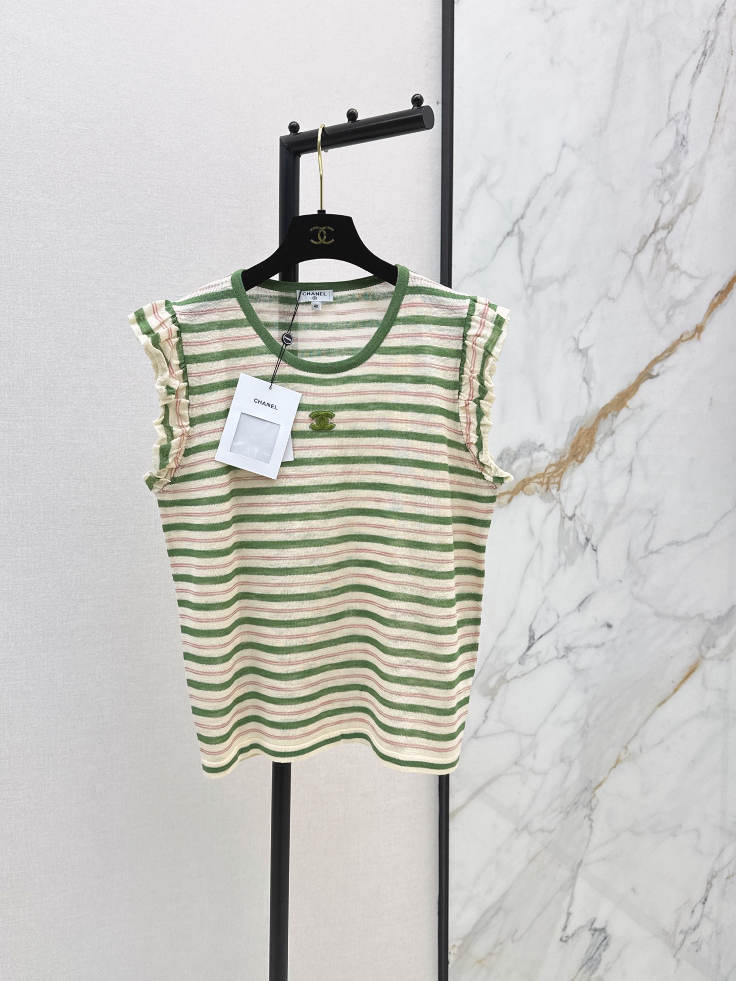 NO:874344,C Home 26Ss————The latest striped sweater for spring and summer. The colorful stripes are fresh and lively. Double C embellishment on the chest. Hollow crocheting process. Breathable and light. Super comfortable to wear in spring and summer. Round neck design. Versatile for daily leisure or vacation. It goes well with skirts or loose pants. Two colors are available now. sml, chanel, skirts,19860909C家 26Ss————春夏最新款条纹针织衫彩色条纹清新又活泼 胸前双C点缀 镂空钩织工艺 透气轻盈 春夏穿超舒服 圆领设计 日常休闲或度假都很百搭 随手搭裙装或宽松裤都很出彩 两色现货发售sml,,chanel,skirts,,Women's clothing