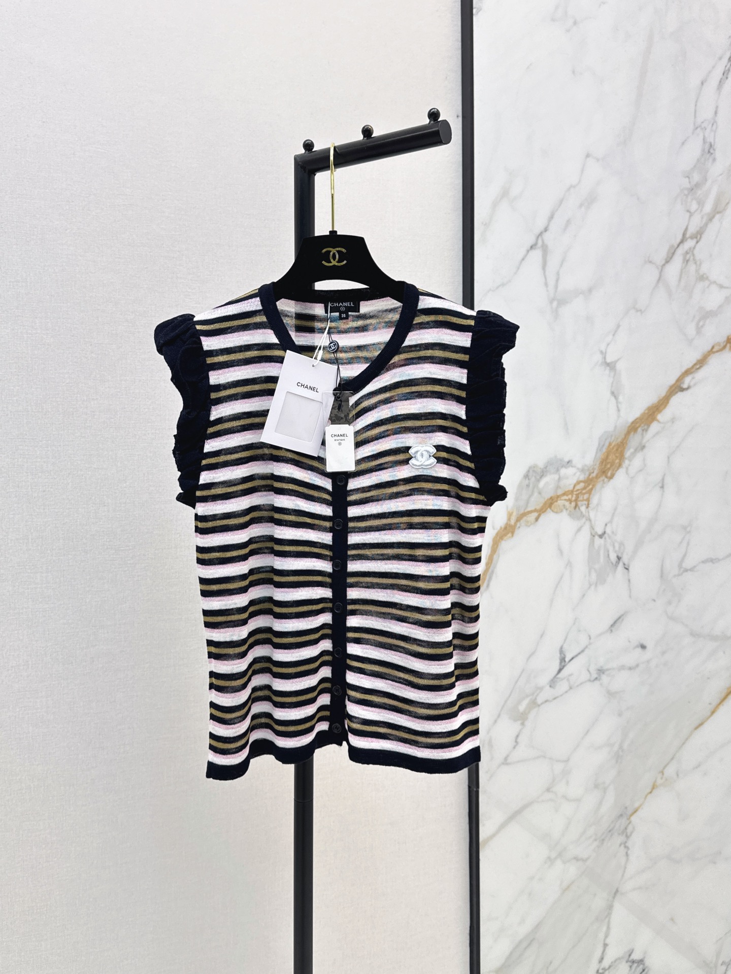 NO:874352,C Home 26Ss————The latest striped sweater for spring and summer. The colorful stripes are fresh and lively. Double C embellishment on the chest. Hollow crocheting process. Breathable and light. Super comfortable to wear in spring and summer. Round neck design. Versatile for daily leisure or vacation. It goes well with skirts or loose pants. Two colors are available now. sml, chanel, skirts,19860909C家 26Ss————春夏最新款条纹针织衫彩色条纹清新又活泼 胸前双C点缀 镂空钩织工艺 透气轻盈 春夏穿超舒服 圆领设计 日常休闲或度假都很百搭 随手搭裙装或宽松裤都很出彩 两色现货发售sml,,chanel,skirts,,Women's clothing