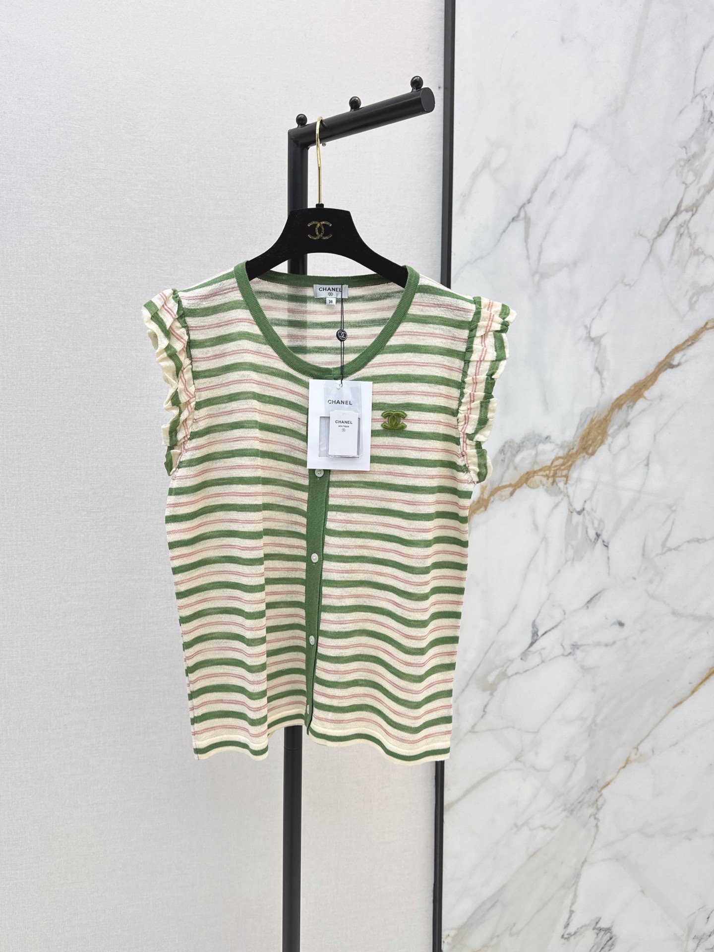 NO:874359,C Home 26Ss————The latest striped sweater for spring and summer. The colorful stripes are fresh and lively. Double C embellishment on the chest. Hollow crocheting process. Breathable and light. Super comfortable to wear in spring and summer. Round neck design. Versatile for daily leisure or vacation. It goes well with skirts or loose pants. Two colors are available now. sml, chanel, skirts,19860909C家 26Ss————春夏最新款条纹针织衫彩色条纹清新又活泼 胸前双C点缀 镂空钩织工艺 透气轻盈 春夏穿超舒服 圆领设计 日常休闲或度假都很百搭 随手搭裙装或宽松裤都很出彩 两色现货发售sml,,chanel,skirts,,Women's clothing