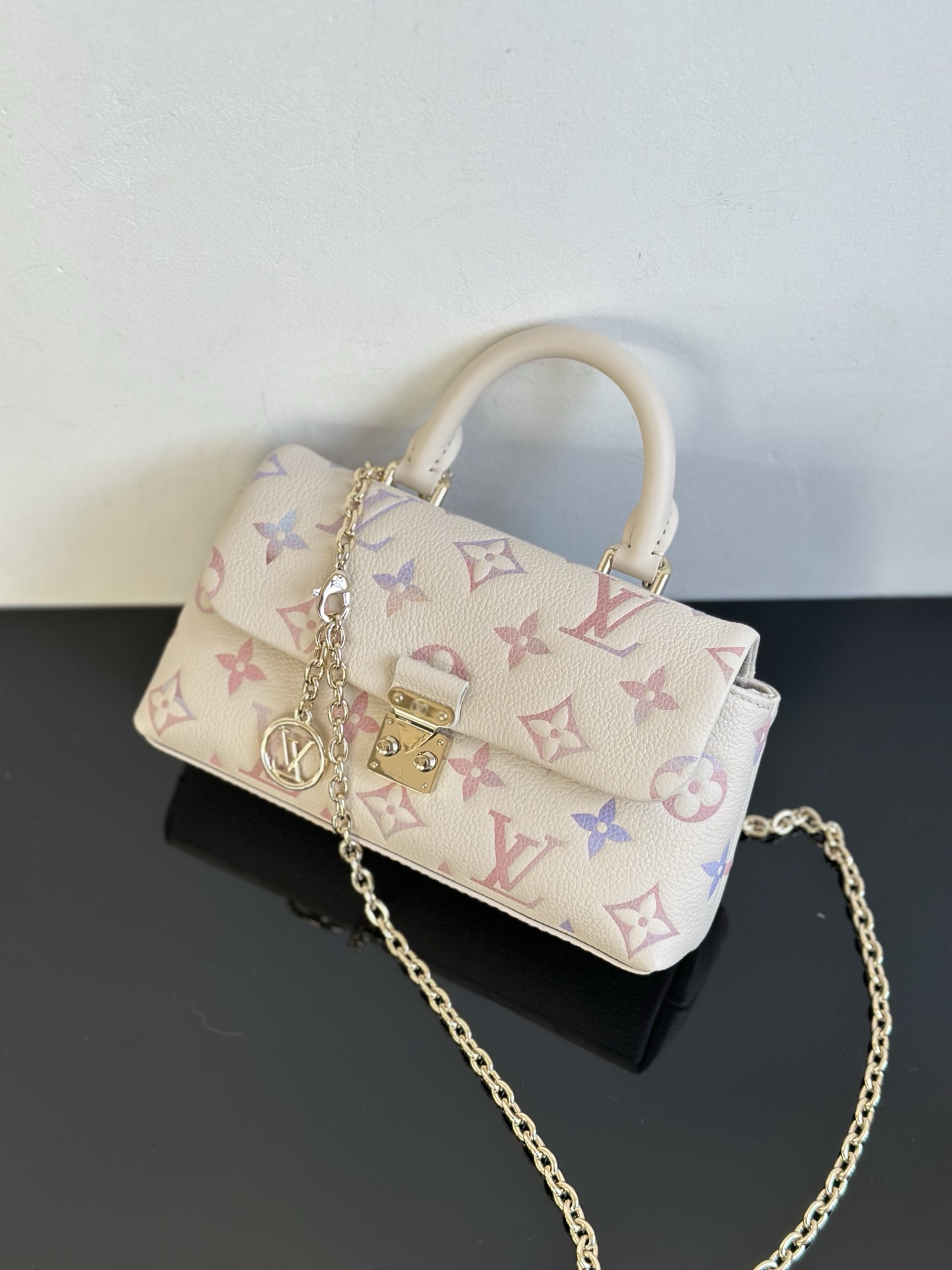 Louis Vuitton Nano Madeleine Monogram Empreinte Leather Handbag, 12.5 x 21 cm 3 i1755931691797 6203 0 2