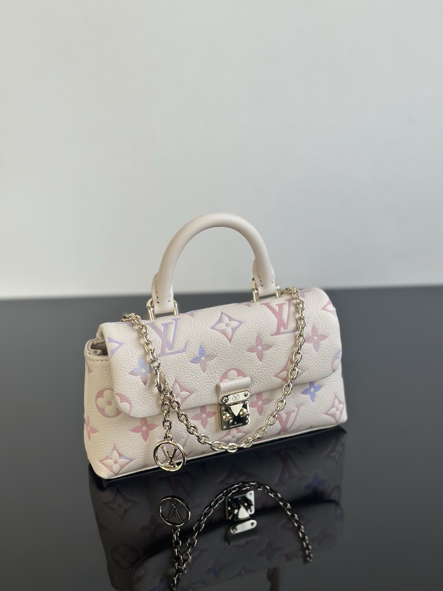 Louis Vuitton Nano Madeleine Monogram Empreinte Leather Handbag, 12.5 x 21 cm 1 i1755931691876 7579 0 0