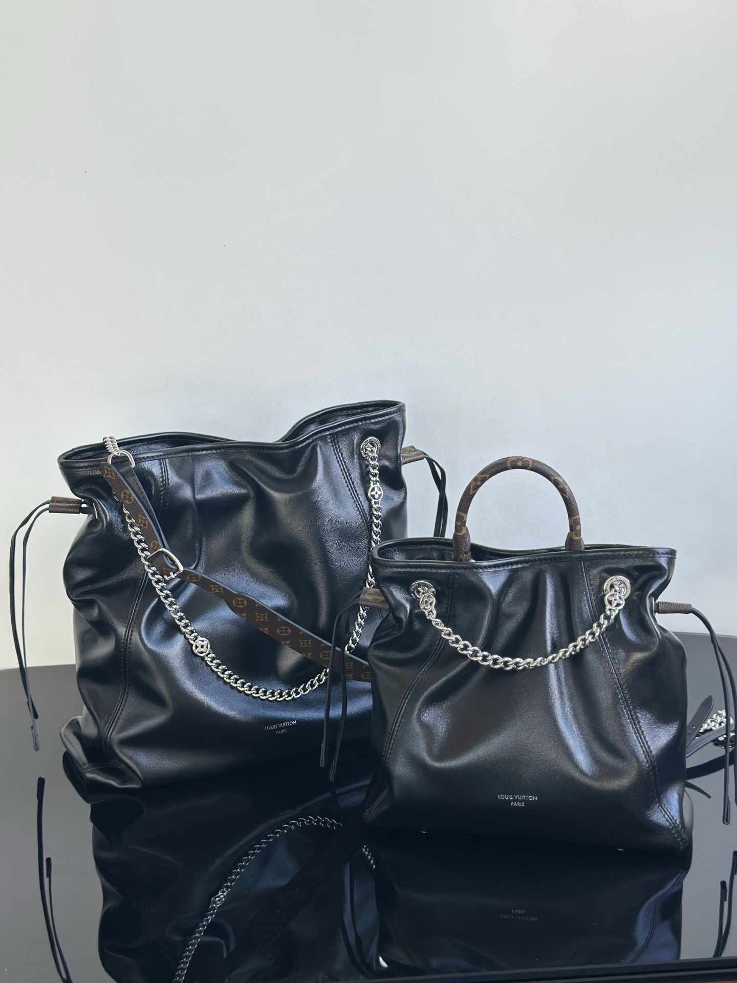 Louis Vuitton Off Duty Vibe Black Leather Shoulder Bag with Chain Detail 1 i1756879160149 1388 0 0