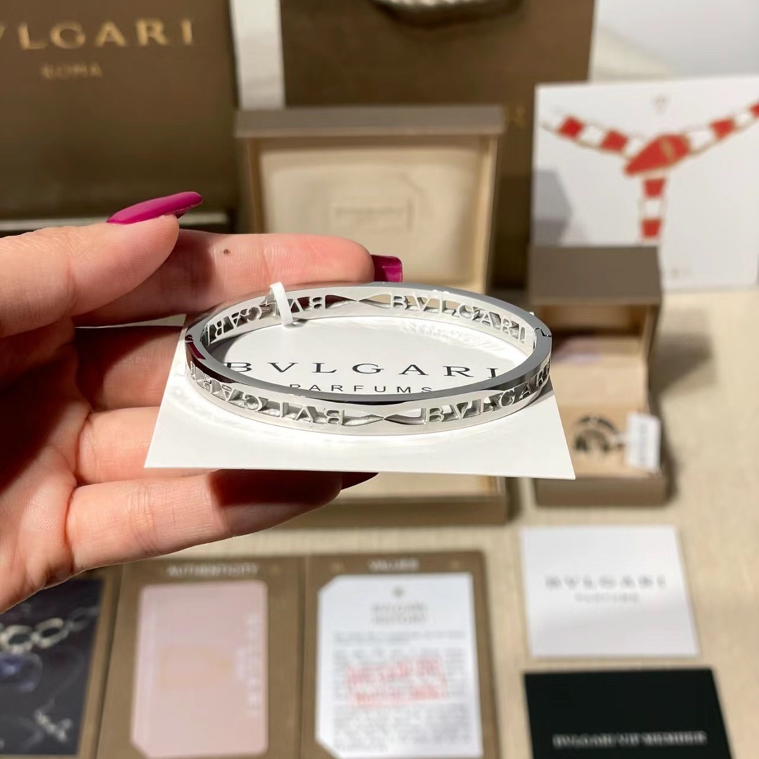 Bvlgari Openwork Cutout Logo Bangle - Comprehensive